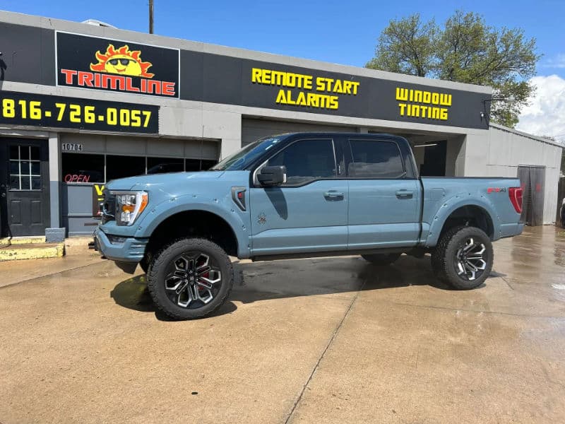 Professional car window tinting installation at Trimline in Independence, MO